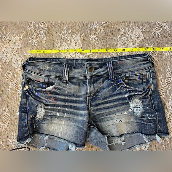 Delia’s Frayed and Paint Splattered Blue Jean Shorts - Picture 6 of 7